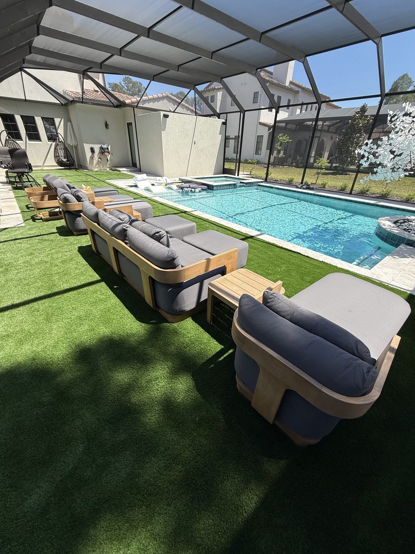 Screened pool lanai and teak furniture